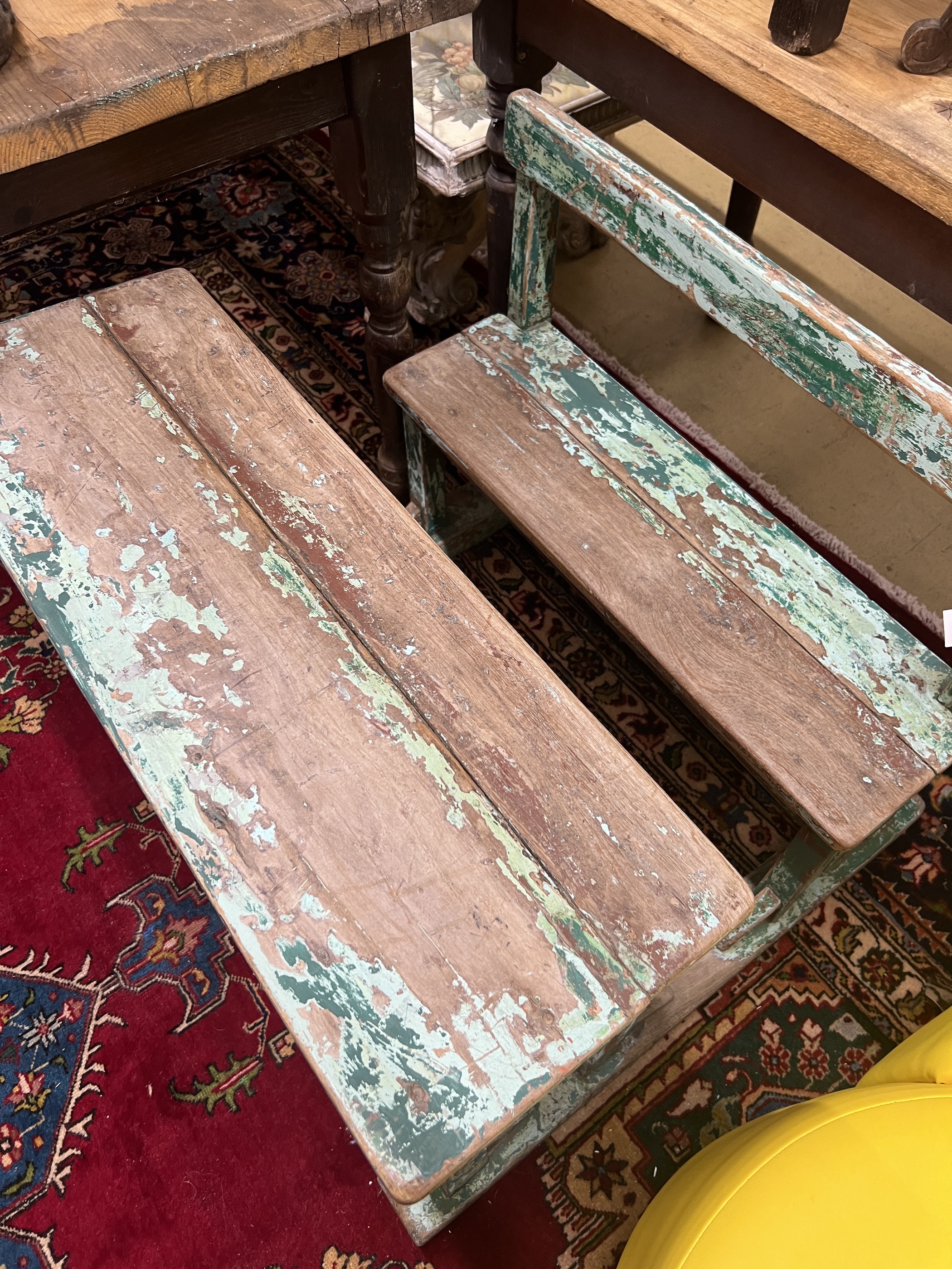 A Continental part painted hardwood child's double desk, width 76cm, depth 76cm, height 60cm
